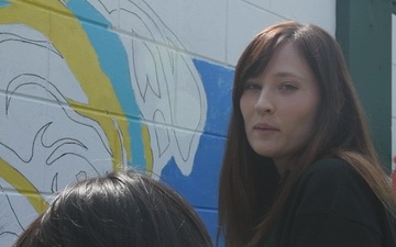 MARFORK Volunteers Join Children In Mural Painting - Capt. Schwien Interview