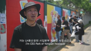 MARFORK Volunteers Join Children In Mural Painting - Mr. Sung Interview