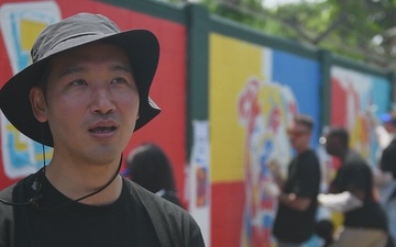 MARFORK Volunteers Join Children In Mural Painting - Mr. Sung Interview