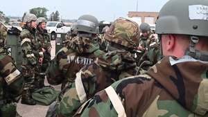 155th ARW perform assignments while in MOPP 4 during Combat Readiness Exercise