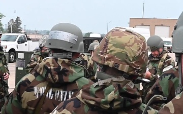 155th ARW perform assignments while in MOPP 4 during Combat Readiness Exercise