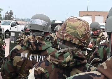 155th ARW perform assignments while in MOPP 4 during Combat Readiness Exercise