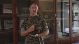 U.S. Marine Corps Gunnery Sergeant receives the Commanding General’s Cowbell Award for improvements to F-35 maintenance equipment