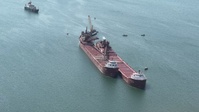 Hay Lake Marine Casualty responders prepare the M/V Honorable James Oberstar for safe transit