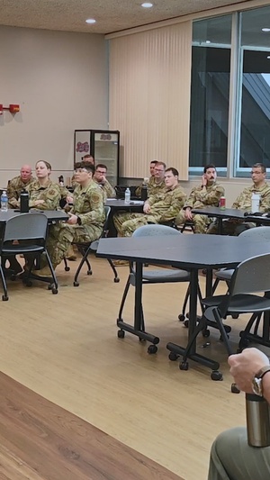 181st Security Forces Squadron attend a professional development briefing at the National Museum of the U.S. Air Force