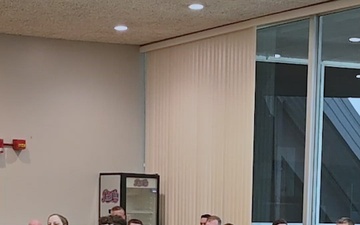 181st Security Forces Squadron attend a professional development briefing at the National Museum of the U.S. Air Force