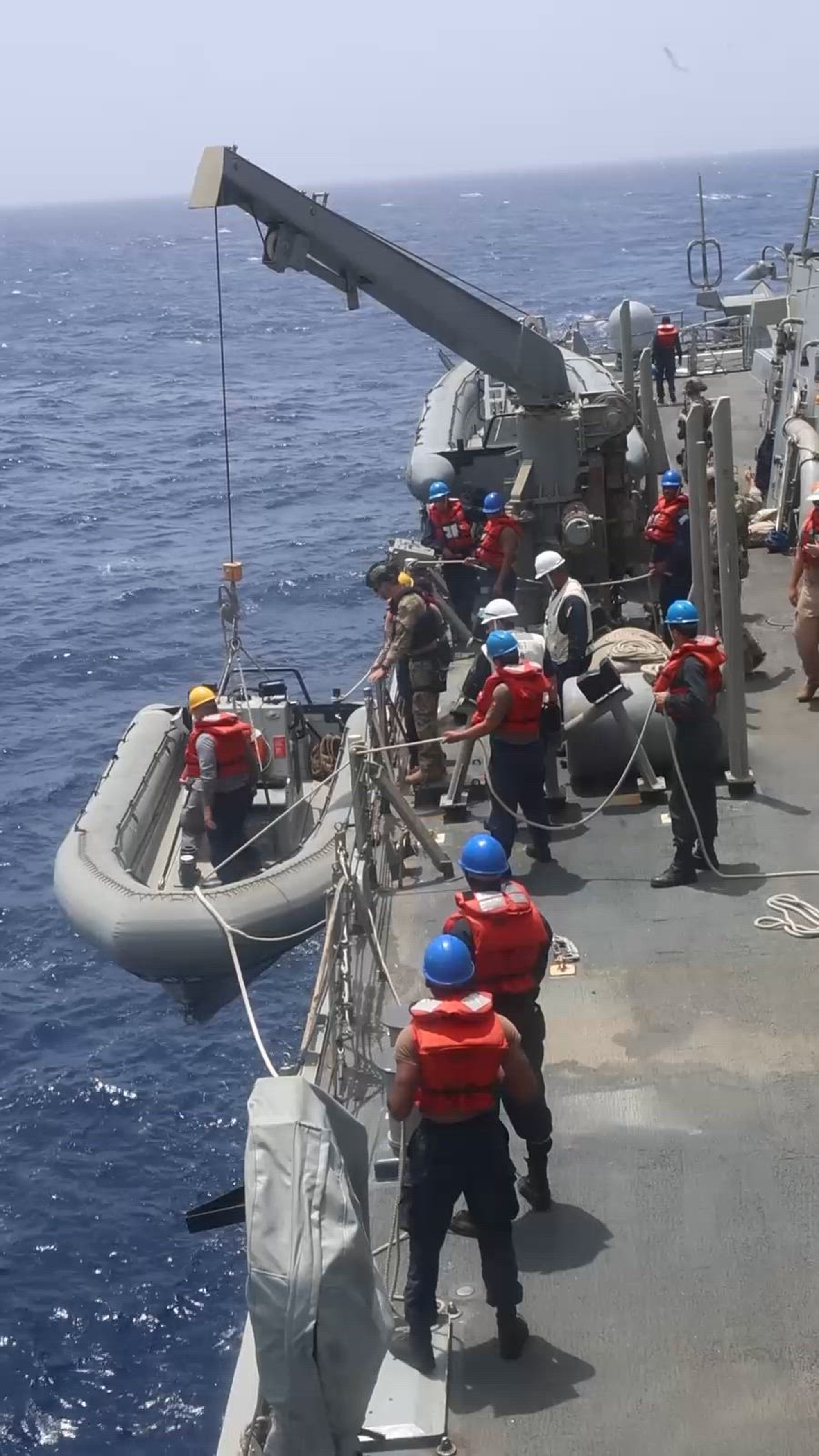 U.S. Navy Sailors and Coast Guardsmen conduct small boat operations aboard the Arleigh Burke-class guided missile destroyer USS Cole (DDG 67) in the Caribbean Sea, June 9, 2025. U.S. Navy assets are deployed under U.S. Northern Command's maritime homeland defense authorities with a U.S. Coast Guard Law Enforcement Detachment embarked to enable maritime interdiction
missions to prevent the flow of illegal drugs and other illegal activity. U.S. Northern Command is working together with the Department of Homeland Security to provide additional military forces and  capabilities at the southern border. (U.S. Navy photo by Mass Communication Specialist 1st Class Jonathan Word)