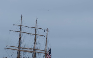 CGC Eagle is pushed by tow boats in San Francisco Bay