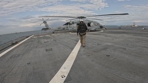 Mass Communication Specialist Captures Photo Exercise