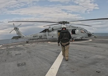 Mass Communication Specialist Captures Photo Exercise