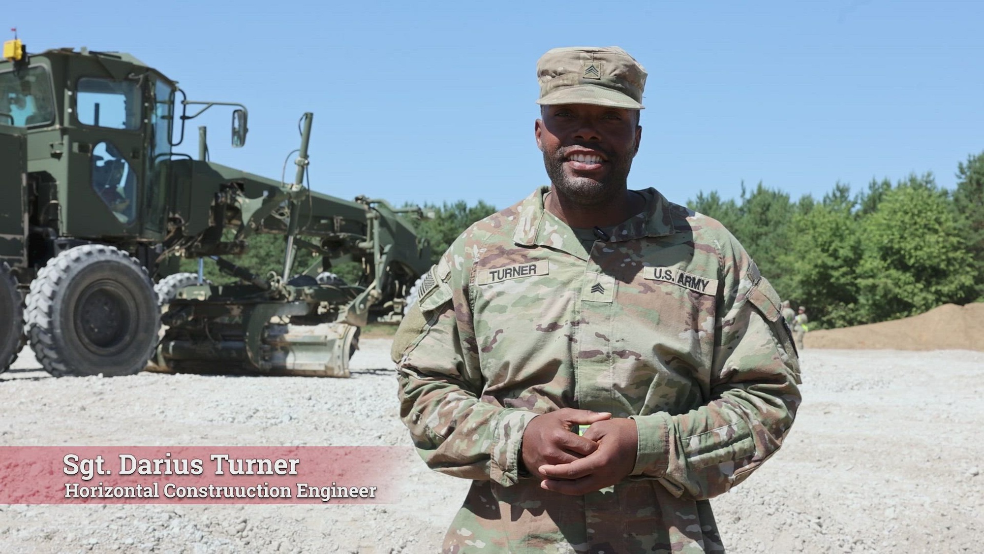 U.S. Army Sgt. Darius Turner, a horizontal construction engineer assigned to the 902nd Engineer Construction Company, 15th Engineer Battalion, 7th Engineer Brigade, discusses ongoing construction projects with Germany’s Spezialpionierregiment 164 at the Drawsko Pomorskie Combat Training Center, Poland, July 1, 2025. The joint effort enhances interoperability and strengthens multinational partnerships.