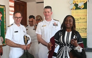 U.S. Navy Rear Adm. Richard S. Lofgren visits Panama school with the  Seabees