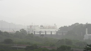 The USNS Comfort crosses the Miraflores Locks