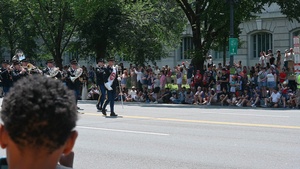 257th Army band parades for Independence Day