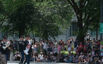 257th Army band parades for Independence Day