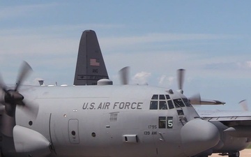 Hercules in Sync: C-130s Launch in Formation Over Rosecrans