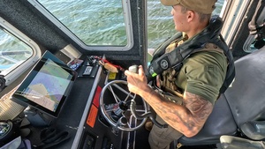 Securing the Seas: 6th Security Forces Marine Patrol on Duty