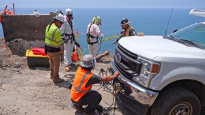 Cliffside debris removal operations 4k60p