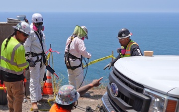 Cliffside debris removal operations 4k60p