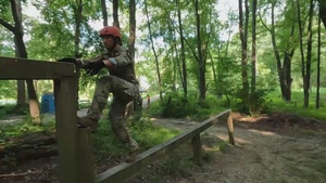 Competitors push through an obstacle course - 2025 National Best Warrior