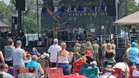 Fort McCoy senior commander, garrison CSM, welcome Lt. Dan Band to Fort McCoy for performance