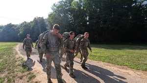 B-Roll: March to kayak race and prepare for bundle drop - 2025 National Best Warrior