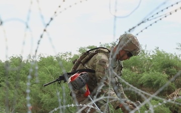 76th Combat Engineer Company-Stryker clear brush to support Border Patrol