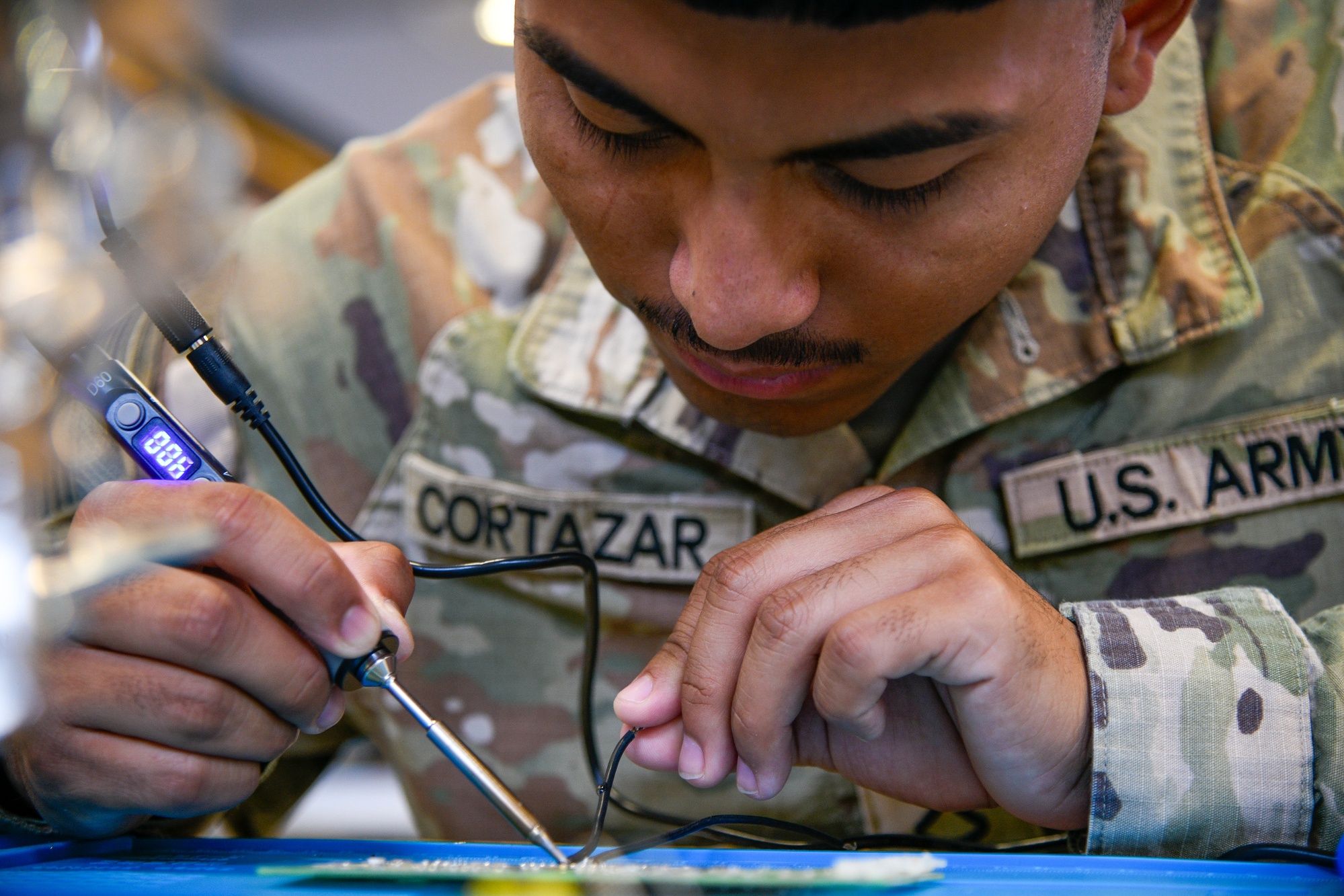 Soldiers assigned to the 2nd Cavalry Regiment are working on assembling Purpose Built Attritable Systems drones during a three-week drone build course on July 21, 2025, at Balli Army Airfield in Germany. The 2CR’s unmanned aircraft systems team are training the Army’s newest drone builders while also assembling these drones ahead of Saber Junction 25. (U.S. Army photo by 1st Sgt. Luisito Brooks)