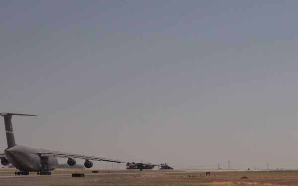 U.S. Air Force C-5M Super Galaxy assigned to the 22nd Airlift Squadron taxis toward Taxiway Hotel