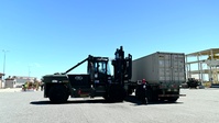 60th Aerial Port Squadron moves a shipping container during Exercise Ultimate Caduceus