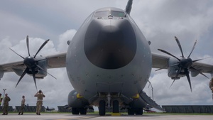 Members of the Royal Air Force prepare an A400 to receive cargo during DLE 2025