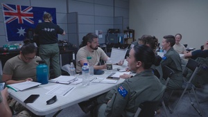 Members of the U.S. Air Force, Royal Australian Air Force and Royal New Zealand Air Force conduct aeromedical evacuation training aboard a C-5 Super Galaxy