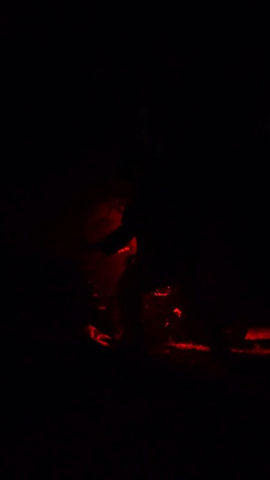 White Devils fire mortars at night during Devil Avalanche