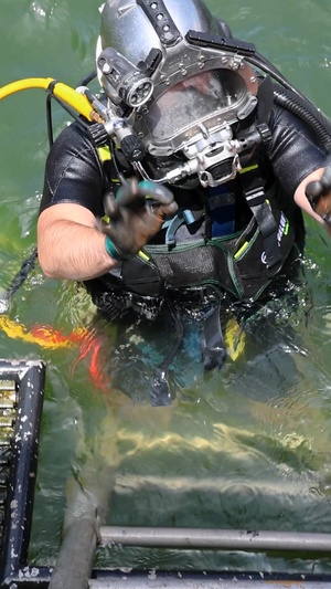 Navy Divers Repair USS Iwo Jima