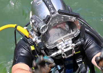 Navy Divers Repair USS Iwo Jima