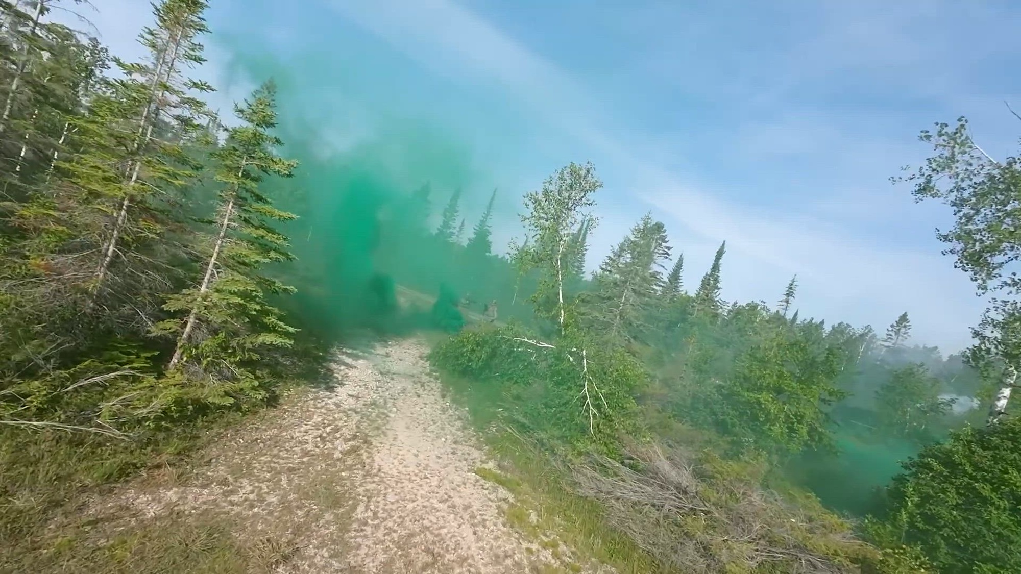 U.S. Air Force Airmen assigned to the 118th Security Forces Squadron conduct field training operations at Alpena Combat Readiness Training Center, Michigan, July 21, 2025. The training includes dismounted patrols through wooded and rocky terrain, surveillance of simulated enemy activity, counter-drone response training, and securing key points. This exercise enhances mission readiness and reinforces core security forces competencies. (U.S. Air National Guard video by Staff Sgt. Roberto Mercado)