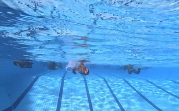 U.S. Marines participate in swim qualification during Exercise Black Jack 25