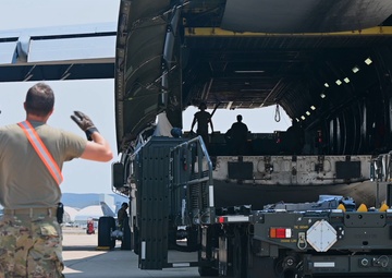 12th Air Task Force Airmen unload a C-5M Super Galaxy during exercise Bamboo Eagle 25-3 (B-Roll)
