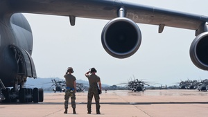 Airmen prepare a C-5M Super Galaxy for departure during exercise Bamboo Eagle 25-3 (B-Roll)