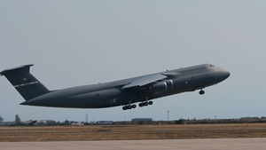 A C-5M Super Galaxy taxis and takes off during exercise Bamboo Eagle 25-3 (B-Roll)