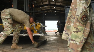 Mobility Airmen prepare cargo for KC-46 loading during Talisman Sabre 25