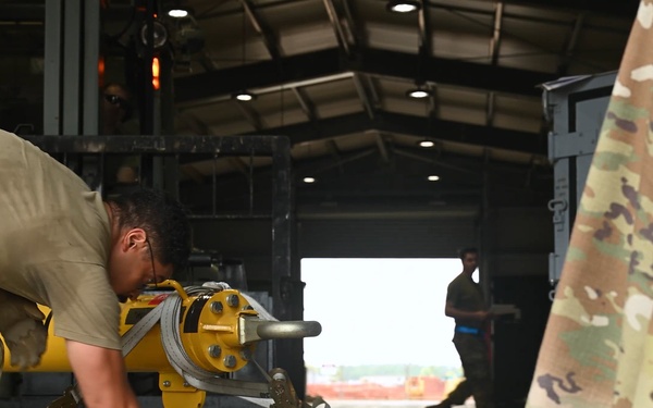 Mobility Airmen prepare cargo for KC-46 loading during Talisman Sabre 25