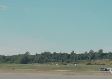 B-Roll: U.S. Airmen with 732nd AMS unload equipment, personnel from a U.S. Marine Corps C-40A during Arctic Edge 25