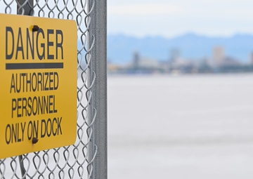 Headline: U.S. joint service members conduct a simulated port seizure during Arctic Edge 2025