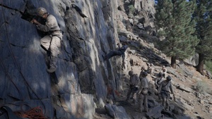 V35 and V11 Marines conduct mock lead climbing during Assault Climbers Course