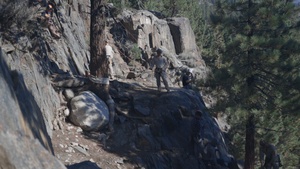 V35 and V11 Marines conduct lead climbing during Assault Climbers Course