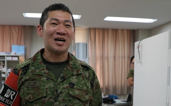 SFC Atsushi Ono serves as an interpreter during Yama Sakura 89