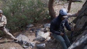 V35 and V11 Marines conduct climbing techniques during Assault Climbers Course