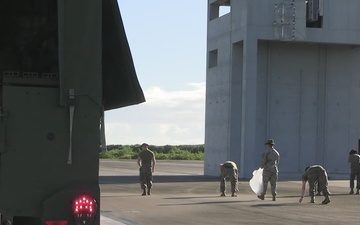 1st MAW Marines clear foreign objects, debris from runway
