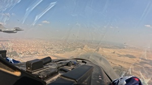 BRIGHT STAR 25: USAF F-16 Fighting Falcon, EAF Dassault Rafale fly over Pyramids